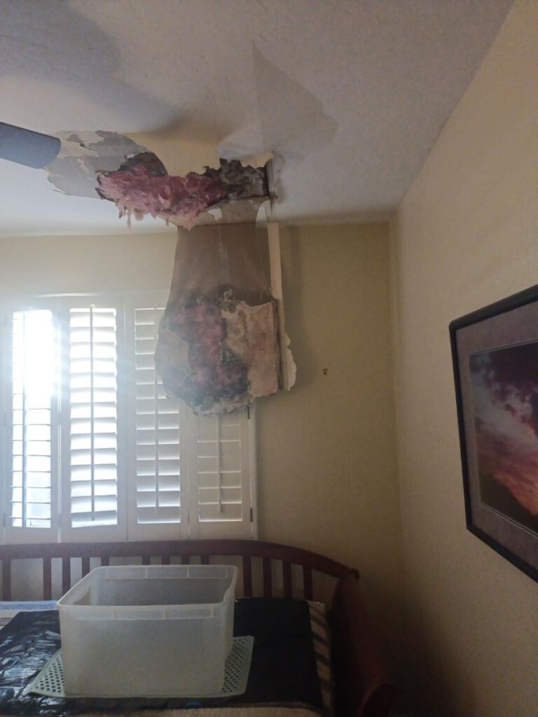 Roof leak damage to ceiling
